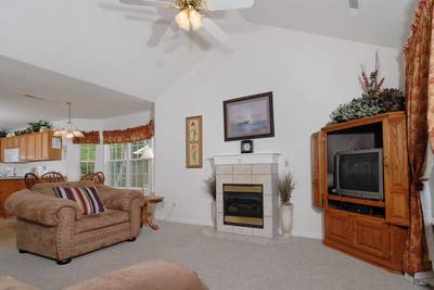 Henderson's Riverside living room with gas fireplace