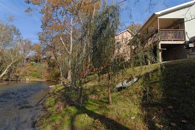 Henderson's Riverside #2 covered back deck overlooking the Little Pigeon River