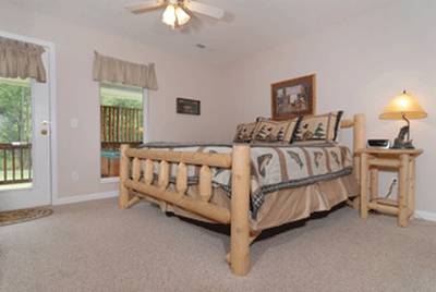 River Escape bedroom two with king size log bed