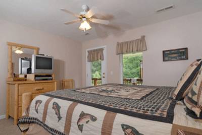 River Escape bedroom two with king size log bed