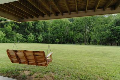 River Escape covered parking area with swing