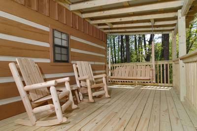 Cozy Bear Escape covered back deck with rocking chairs