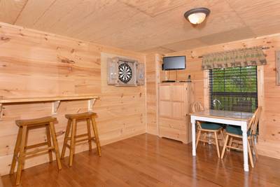 Beary Beary Special lower level game room with dart board