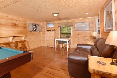 Beary Beary Special lower level game room with dart board