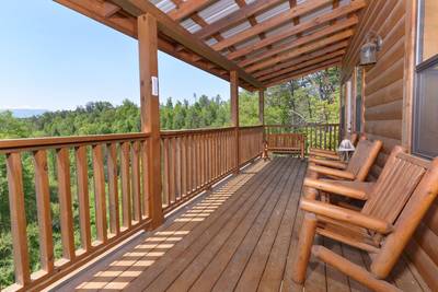 Relaxing Pigeon Forge Cabin Outdoor Covered Seating Area