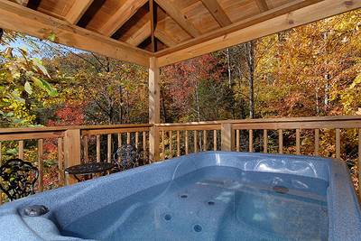 Allen's Hideaway covered hot tub deck in fall