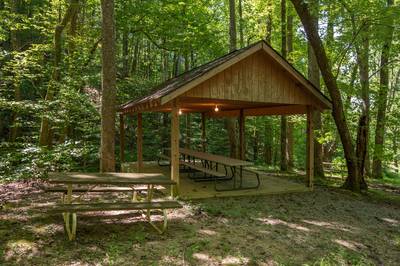 Caney Creek Mountain Area community pavilion with picnic tables