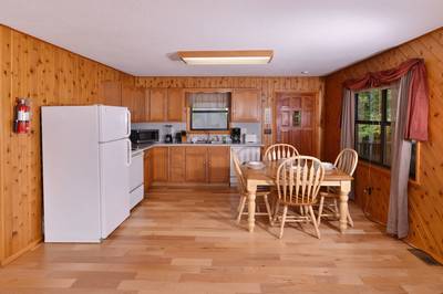 Lakeview dining table and fully furnished kitchen