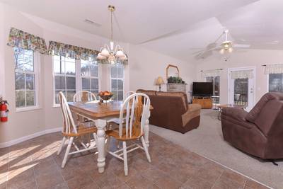 River Escape dining area and living room