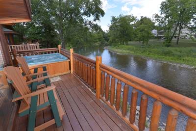 Down by the River back deck with hot tub
