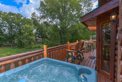 Down by the River back deck with hot tub