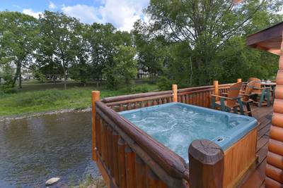 Down by the River back deck with hot tub