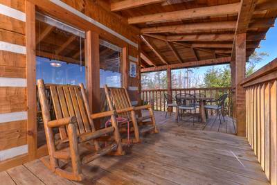 Buck Naked wrap around deck with rocking chairs