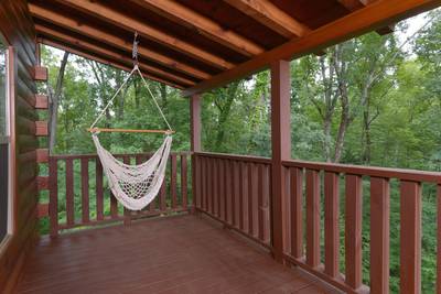 Antler Run covered deck with hammock